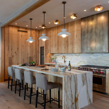 Proper Vibes Penthouse Kitchen with Onyx-Carved Lights