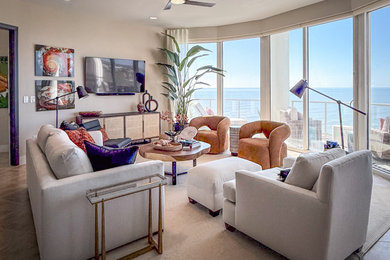 Example of an island style living room design in Houston