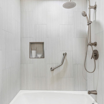 Modern Shower Renovation with Tile Wall and Brushed Nickel Fixtures