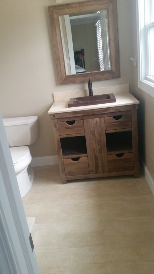 Need advice on what to put in empty spaces on walls in bathroom.