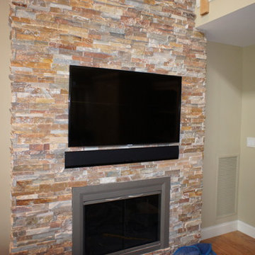 Over-fireplace LED TV Installation with Sound Bar on Brick