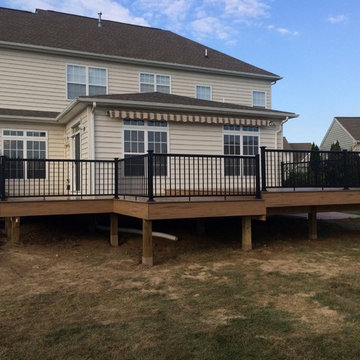 Timbertech legacy deck with aluminum rails with lighted post caps.