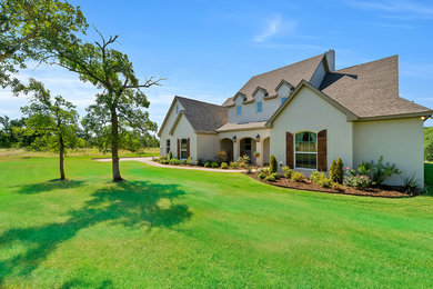 Inspiration for a farmhouse white exterior home remodel in Dallas