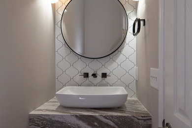 Example of an eclectic powder room design in Charleston