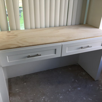 Kitchen white shaker upper cabinets and dark grey shaker base cabinets