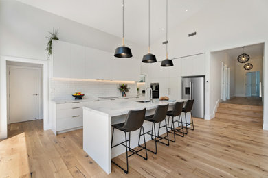 Character home renovation and addition makes the most of it's serene position.