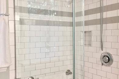 Small traditional master bathroom in Raleigh with a corner shower, green tile, ceramic tile, porcelain floors, an undermount sink, marble benchtops and a hinged shower door.