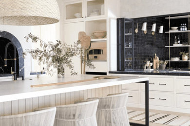 Inspiration for a coastal home design remodel in Phoenix