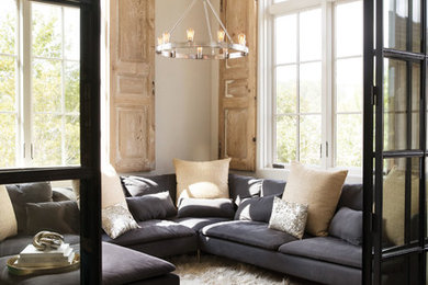 Living room - contemporary living room idea in Cleveland with beige walls