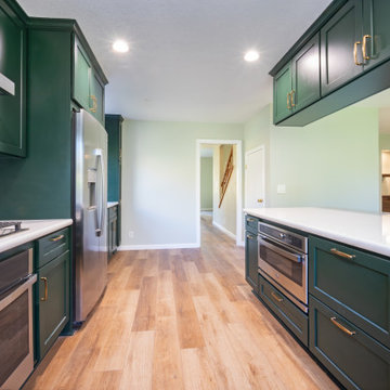 Danbury door style, painted in Roycroft Bottle Green from Sherwin Williams