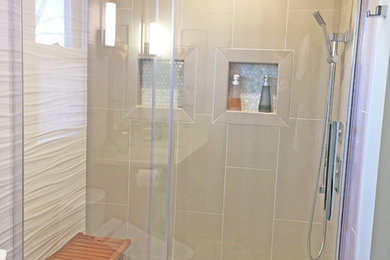 Inspiration for a mid-sized contemporary beige tile and ceramic tile porcelain tile and beige floor bathroom remodel in Other with flat-panel cabinets, medium tone wood cabinets, granite countertops, beige countertops, a bidet, white walls and a drop-in sink
