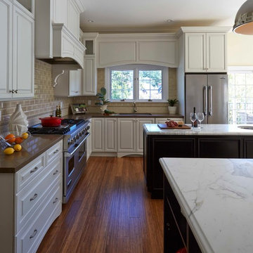 Kitchen with Two-tone Cabinetry and Counters