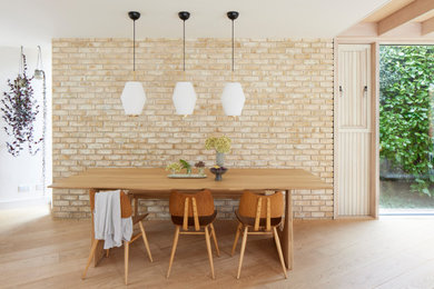 Inspiration for a midcentury dining room in Hampshire.