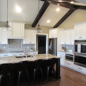 White Farmhouse Kitchen w/ Rustic Cathedral Ceilings
