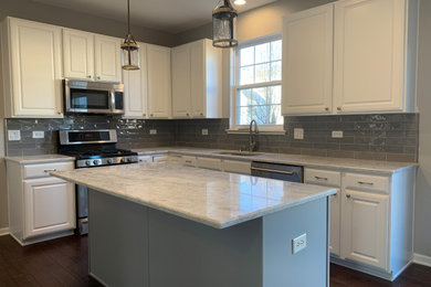 Example of a minimalist kitchen design in Other