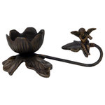 Dale Tiffany - Springdale 3" Angel Viol" Metal Candle Holder - Our Angel Violin Candle Holder is will be a delightful addition to any home?s decor. The candle holder features a cut leaf candle cup atop a leaf base that is finished in an antique brass look. The candle cup accommodates a small pillar, ball, or votive candle for versatility, allowing you to change up the look. A gracefully scrolled branch, finished to match, juts out to one side of the candle cup. The branch features a cut leaf on its end upon which sits a cherubic angel, depicted playing a violin. A heavenly gift for almost any occasion, our Angel Violin Candle Holder will delight your family and friends for many years to come.  (Candles Not Included)