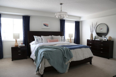 Bedroom - mid-sized transitional master carpeted and beige floor bedroom idea in Toronto with white walls and no fireplace