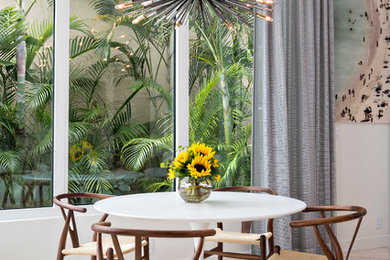 Mid-sized trendy great room photo in New York with white walls and no fireplace