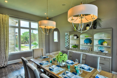 Inspiration for a small contemporary dark wood floor kitchen/dining room combo remodel in Austin with gray walls
