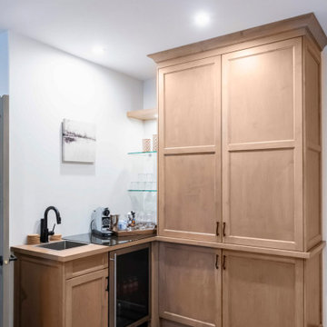 An wet bar & pantry in Natural Maple
