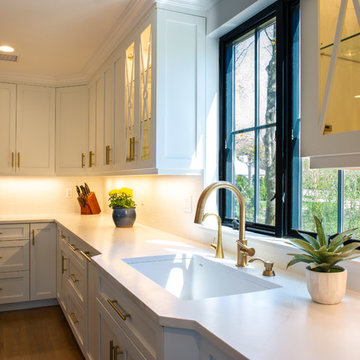 White Modern Kitchen with Compac Quartz Counters and Island