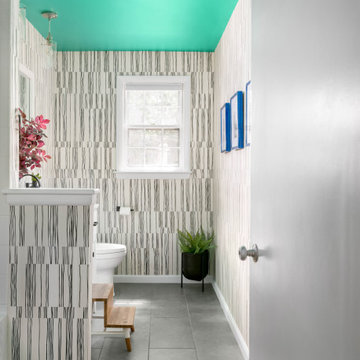 Bathroom With Teal Ceiling and Graphic Wallpaper