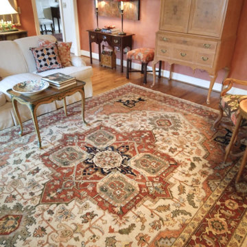 Nilipour Oriental Rugs Serapi Rug updates traditional living room design!
