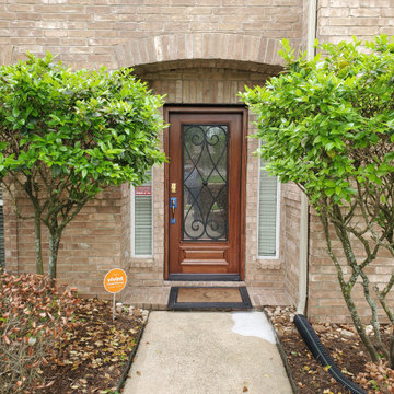 Wood Doors with Wrought Iron