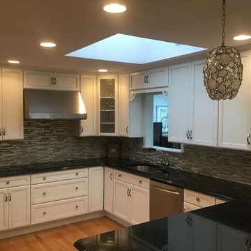 Cherry cabinets finished in Simply White