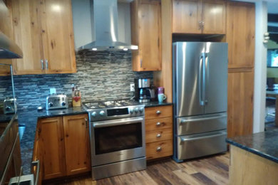 Kitchen - rustic kitchen idea in Other