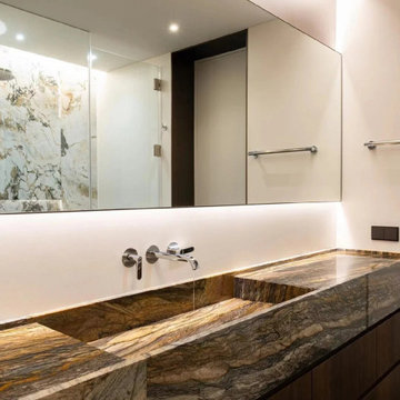 Brown natural marble wash basin solid wood bathroom cabinet.