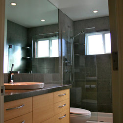 Island Stone Pebble bathroom floor - Tile