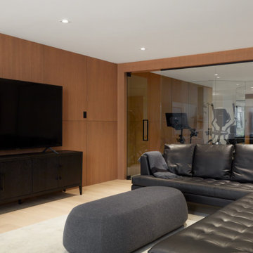 Modern Basement Lounge with Red Oak Wall Panelling
