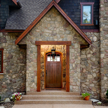 Traditional Exteriors Featuring Stone
