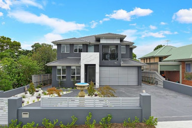 Two-storey grey townhouse exterior in Sydney.