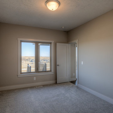 Custom Newport w/ side-load garage and master w/ sitting room