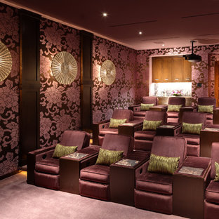 Design ideas for a large world-inspired enclosed home cinema in Orange County with purple walls, carpet, purple floors and a projector screen.