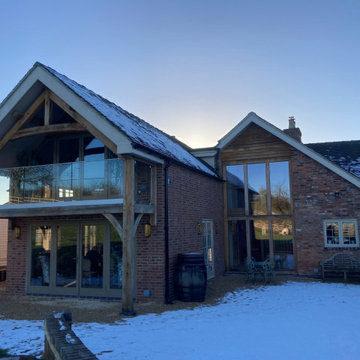 Double & single storey rear extensions with balcony & internal alterations