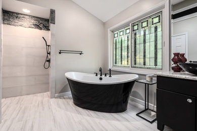Inspiration for a contemporary master black and white tile and ceramic tile porcelain tile and white floor bathroom remodel in Other with flat-panel cabinets, black cabinets, white walls, a vessel sink and quartz countertops