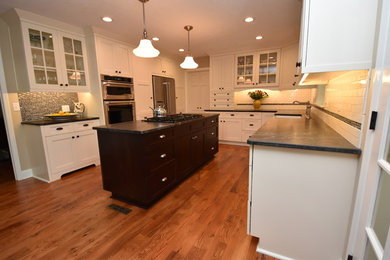 Example of a classic kitchen design in Other