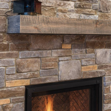 Elegant Farmhouse Interior with Rustic Mantle on Fireplace