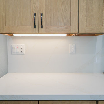Modern Light Oak Shaker Kitchen with Waterfall Quartz Island P3| The Cabination