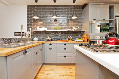 Example of a trendy kitchen design in Toronto