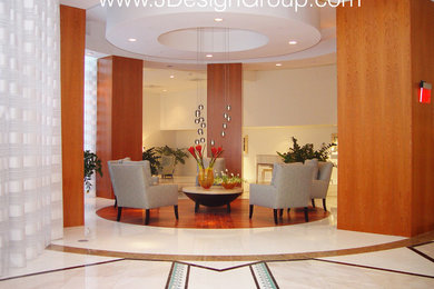 Family room - huge modern open concept marble floor and multicolored floor family room idea in Miami with white walls