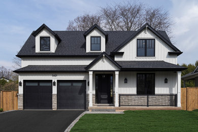 Example of a transitional exterior home design in Toronto