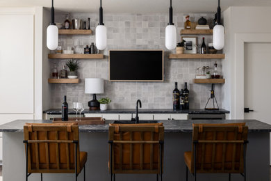 Example of a trendy home bar design in Kansas City