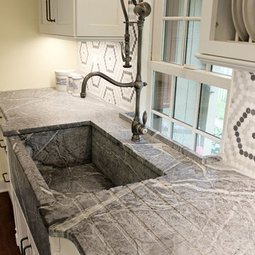 White Cabinets, Grey Countertops and Edgy Tile Backsplash