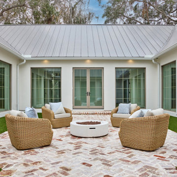 Central Glass Atrium with Indoor-Outdoor Connection