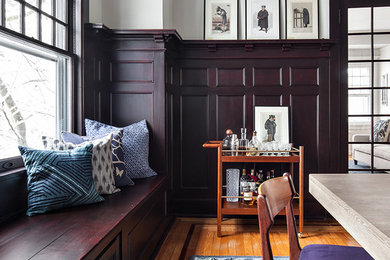 Inspiration for a large transitional medium tone wood floor enclosed dining room remodel in New York with white walls and no fireplace