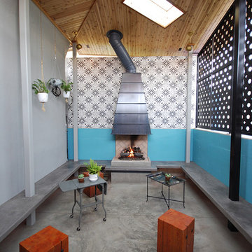 Enclosed exterior patio with fireplace